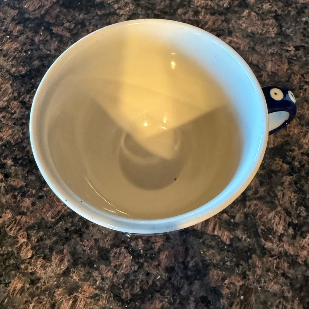 This is a Bolesławiec Polish pottery cup in the "Mosquito" pattern - Picture 2 of 4